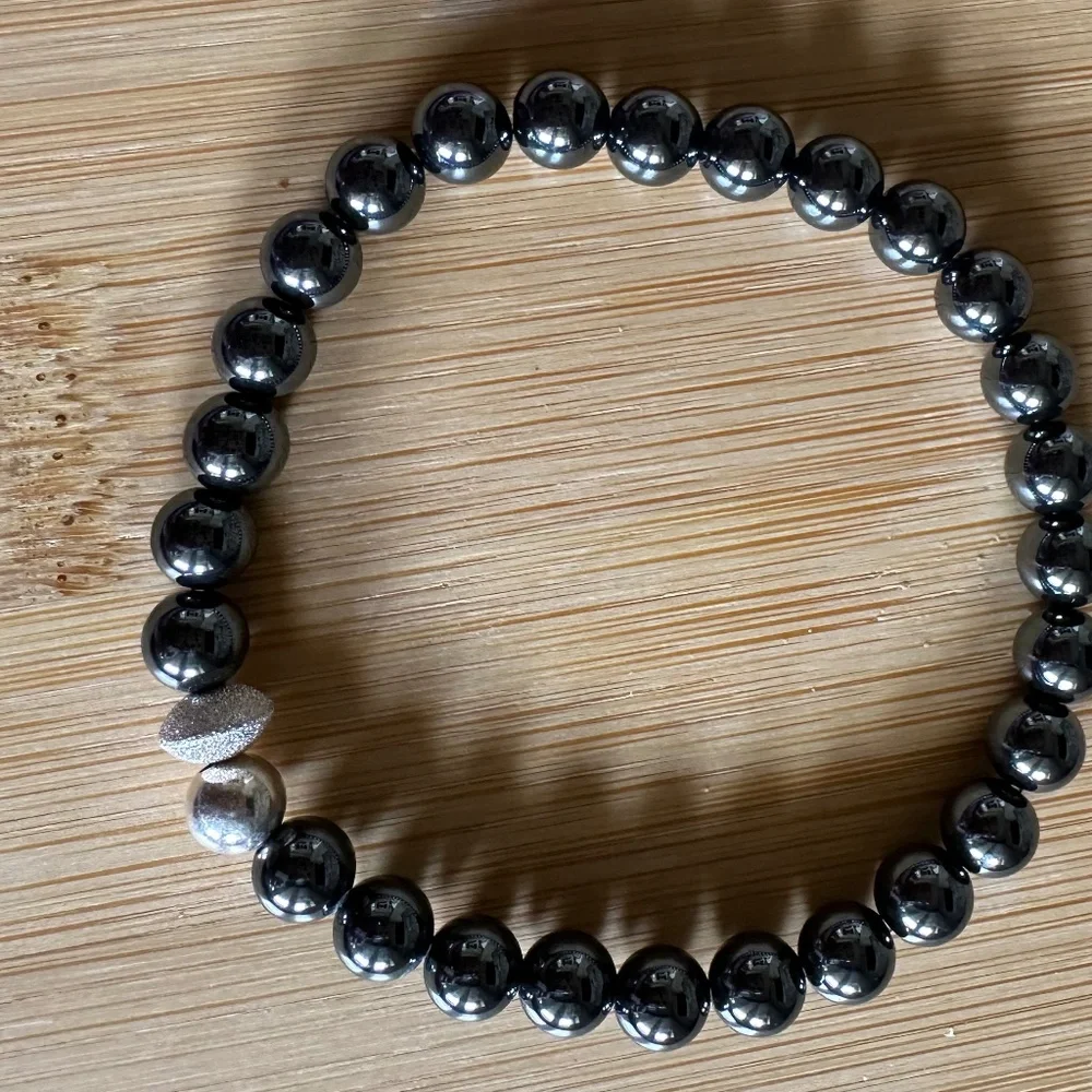 Polished 6mm Polished Jet Hematite Stretch Bracelet w/ Sterling Silver Spacers
